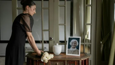Urn and flowers prepared for a committal service for cremation.