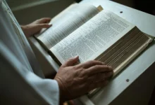 Bible open with highlighted verses for reflection.