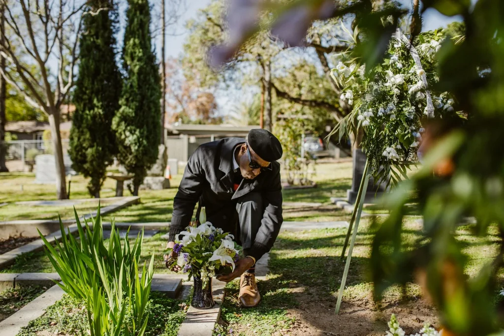 Peaceful sunset over a cemetery at the conclusion of a service.